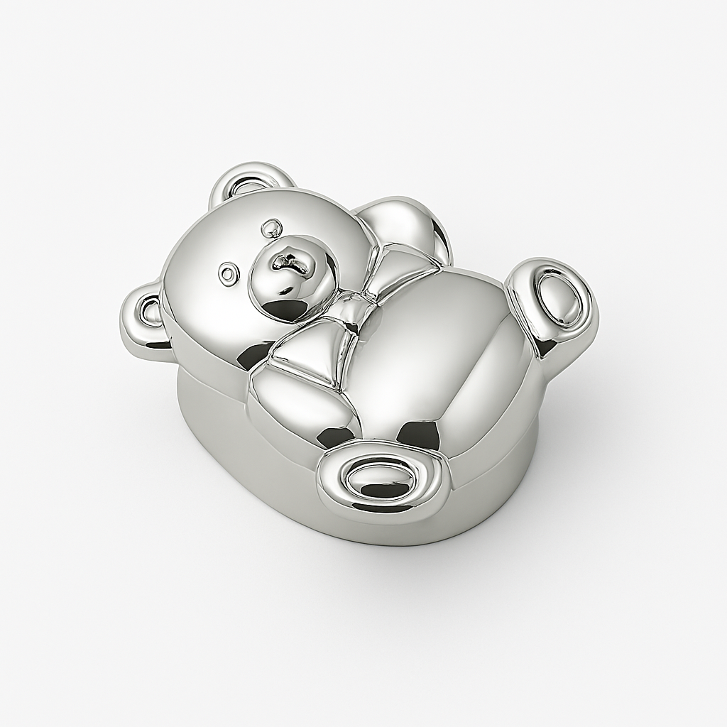 Sterling silver teddy bear pillbox on white background, polished finish, bowtie detail.