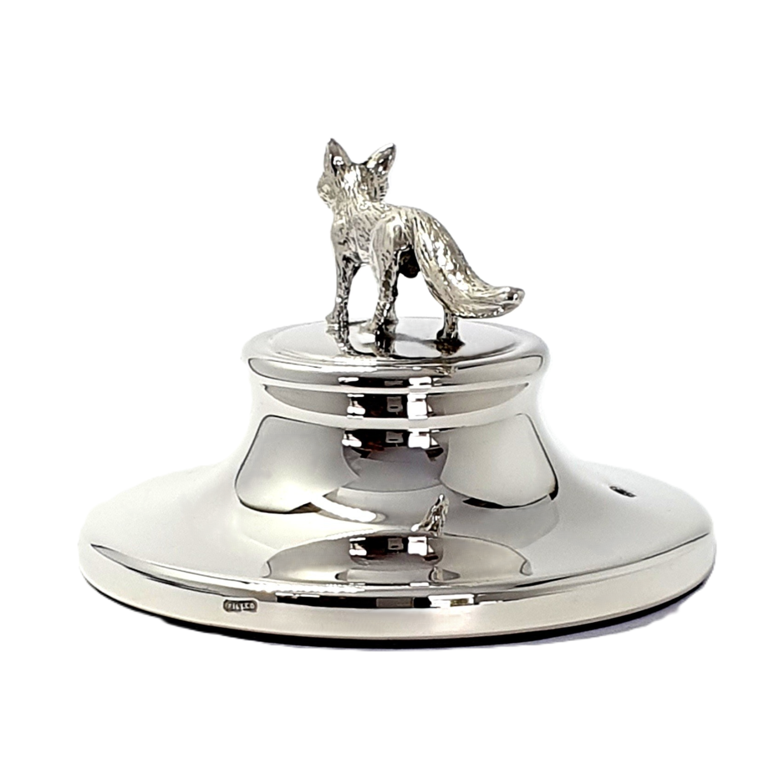 Sterling Silver Fox Paperweight pictured from behind showing the bushy tai
