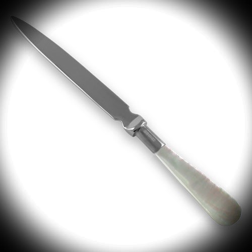 Sterling silver and mother of pearl paper knife photographed against a soft spotlight-style background, with a white centre fading to a darker edge. The lighting draws focus to the blade and handle, enhancing the reflective silver and iridescent mother of pearl.