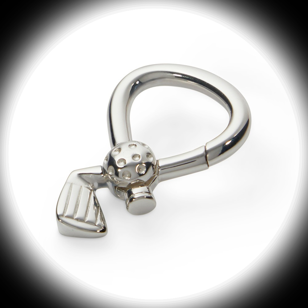 Genuine silver golf club and ball key ring is presented on a white background with a soft black‑shaded spotlight effect. The left‑facing angle emphasizes the club’s elegant curve and the textured ball detail.