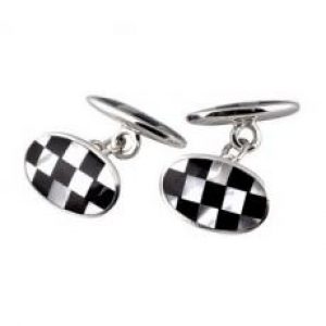 Oval black and white chequered sterling silver chain‑link cufflinks displayed on a plain white background