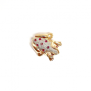 Yellow and white gold frog brooch with red rubies and white diamonds.