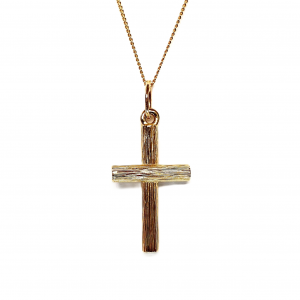 9ct gold cross pendant with hand-engraved tree bark texture.
