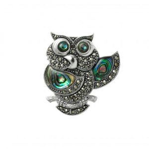 Designed and made in Britain in sterling silver and marcasites, this owl brooch is truly unique due to the use of multi-coloured abalone shell to the wings and eyes no two brooches are the same.