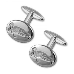 A classic solid sterling silver oval cufflink deep carved engravimg with meticulous detail of a golfer taking a shot with torpedo sprung backs