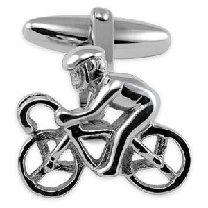 A striking pair of sterling silver cufflinks a carved racing cyclist on a bike with a helmet.
