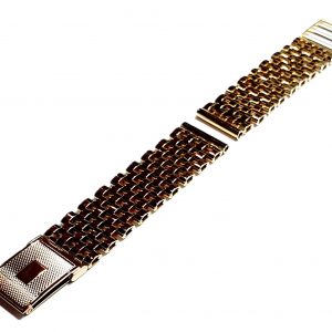 9ct yellow gold watch bracelet GWQ00018  handmade in the United Kingdom, each solid link has been carefully put together and soldered by hand with thick gold pins, and the sturdy gold clasp has a gorgeous engine-turned pattern with a plain cartouche suitable for engraving if you so wish.