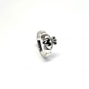 A 9ct white gold Claddagh ring (Irish fáinne Chladaigh) is a traditional Irish ring in which a heart represents love, the crown stands for loyalty, and two clasped hands symbolize friendship.