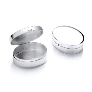 Plain, highly polished St Thomas sterling silver oval pill box PB00007 open and closed on a white background PB00007
