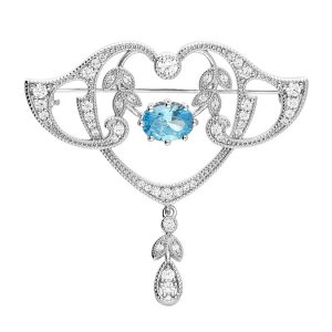 Sterling Silver Art Nouveau Style Brooch with blue and white stones displayed on a clean white background.
