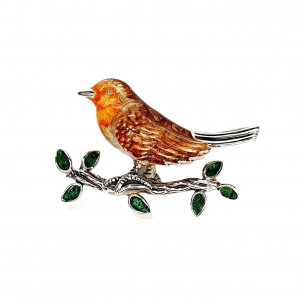 Saturno silver enamelled robin red breast brooch sitting on a branch with enamelled green leaves.