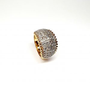 Bombay ring with Seventy round diamonds In a rhodium Pave setting, the total diamond weight is approx. one carat with 7.8 grams of 18ct yellow gold width at the top widest part is 13.6mm tapering to 3.6mm at the back