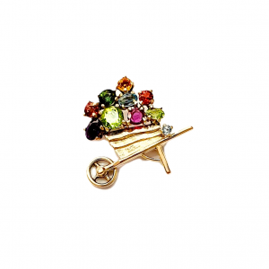 Front View 1: An image of the front of the Barrow-in-Furness 9ct Gold Gemstone Wheel Barrow Brooch, displaying the amethyst, blue topaz, citrine, garnet, peridot, and tourmaline set in yellow gold.